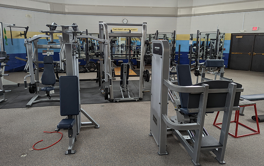 Room filled with Fitness Center equipment