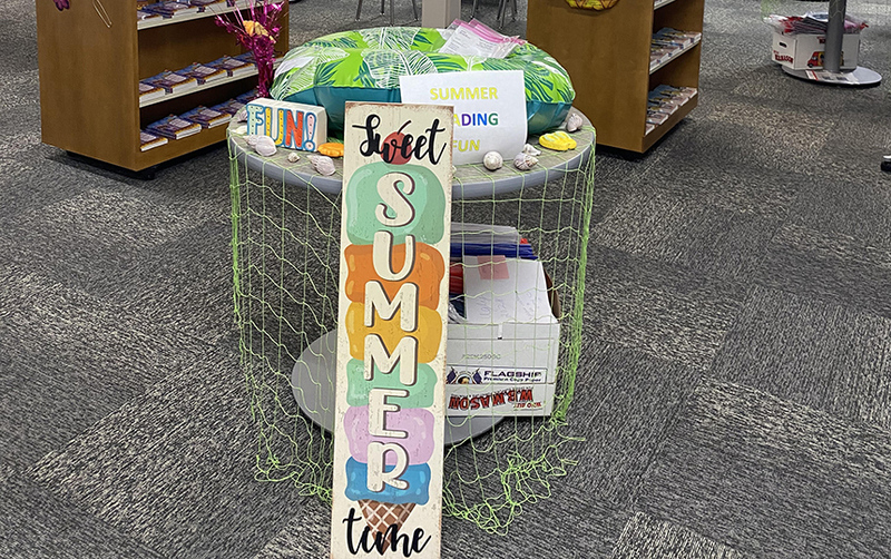 round table decorated with colorful signs encouraging reading