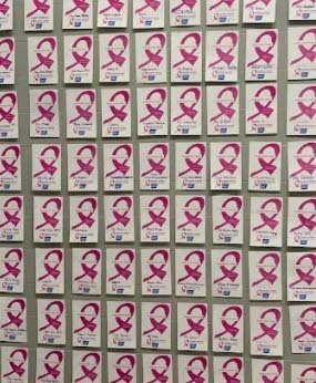 pink ribbon labels in window