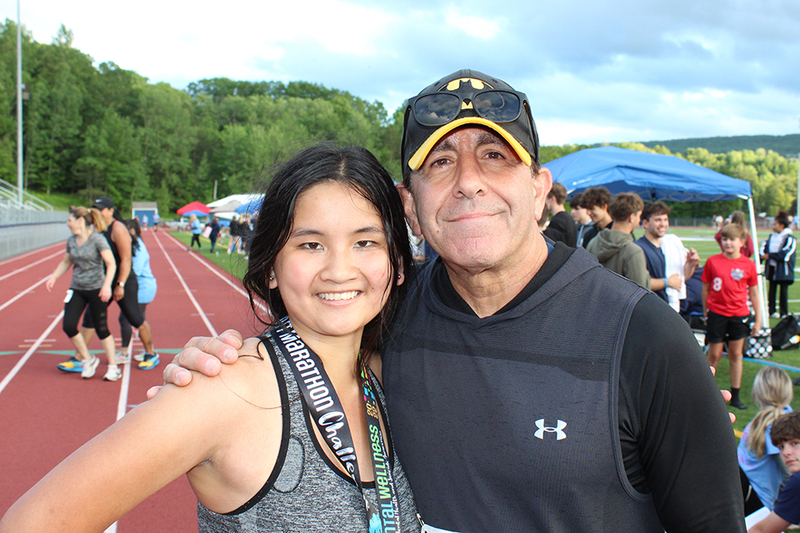 man, woman, outdoors, trees, running track