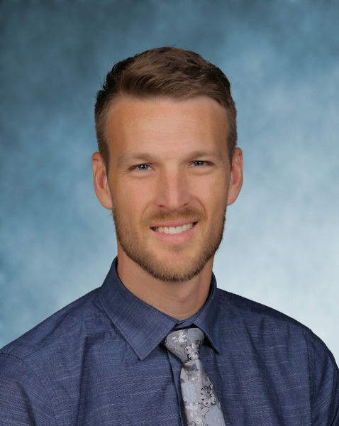 closeup of man smiling, tie