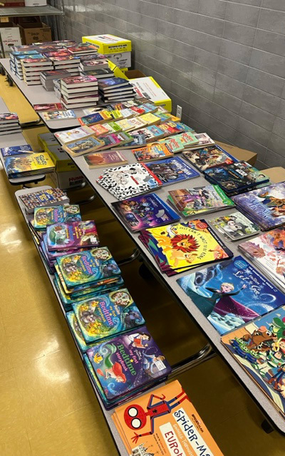 piles of books on tables