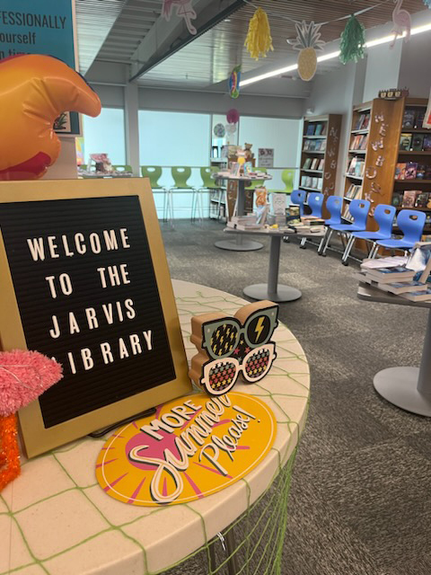 school library, books, chairs, signs